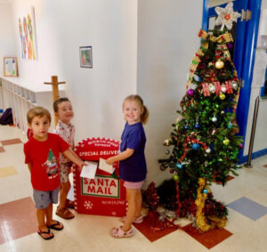 Santa enlists help of Ys Mens Club